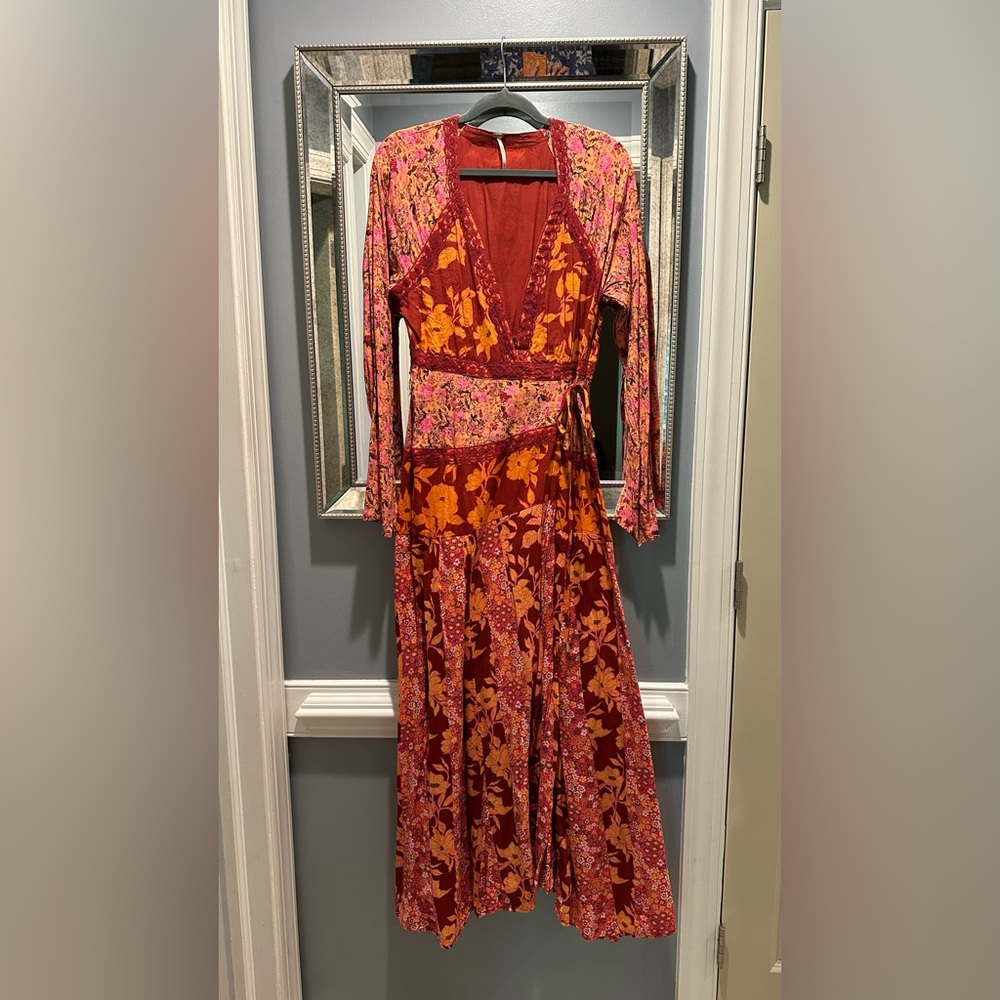 Free people Tilda maxi wrap dress. Never worn. Size medium.